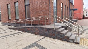 ADA accessible concrete ramp at a municipal building